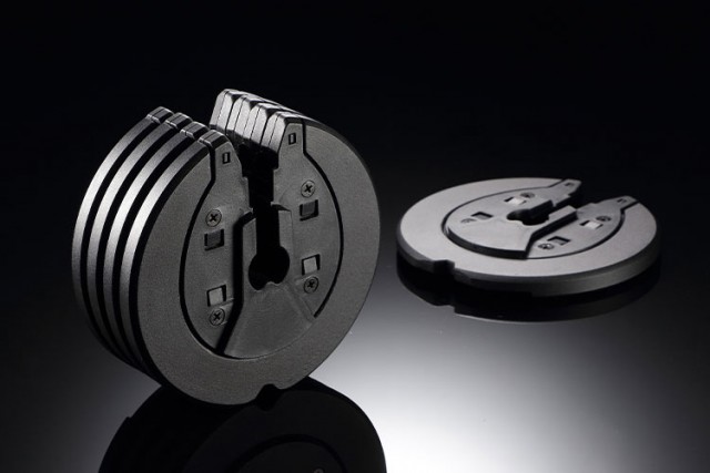 Disassembled weight plates of the T9 series dumbbell set.