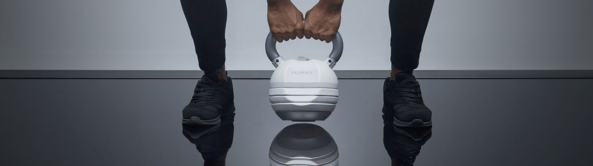 40lb white adjustable kettlebell in use for workout - Floriey